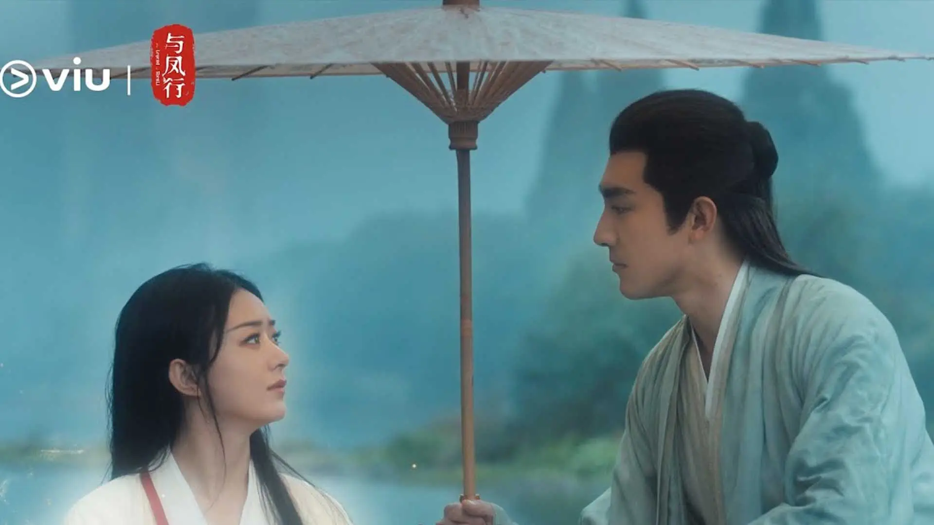 مردی در سریال The Legend of Shen Li یک چتر برای یک زن گرفته است ۳۰ تا از بهترین سریال های چینی بهمراه امتیاز IMDB ایتی مایتی